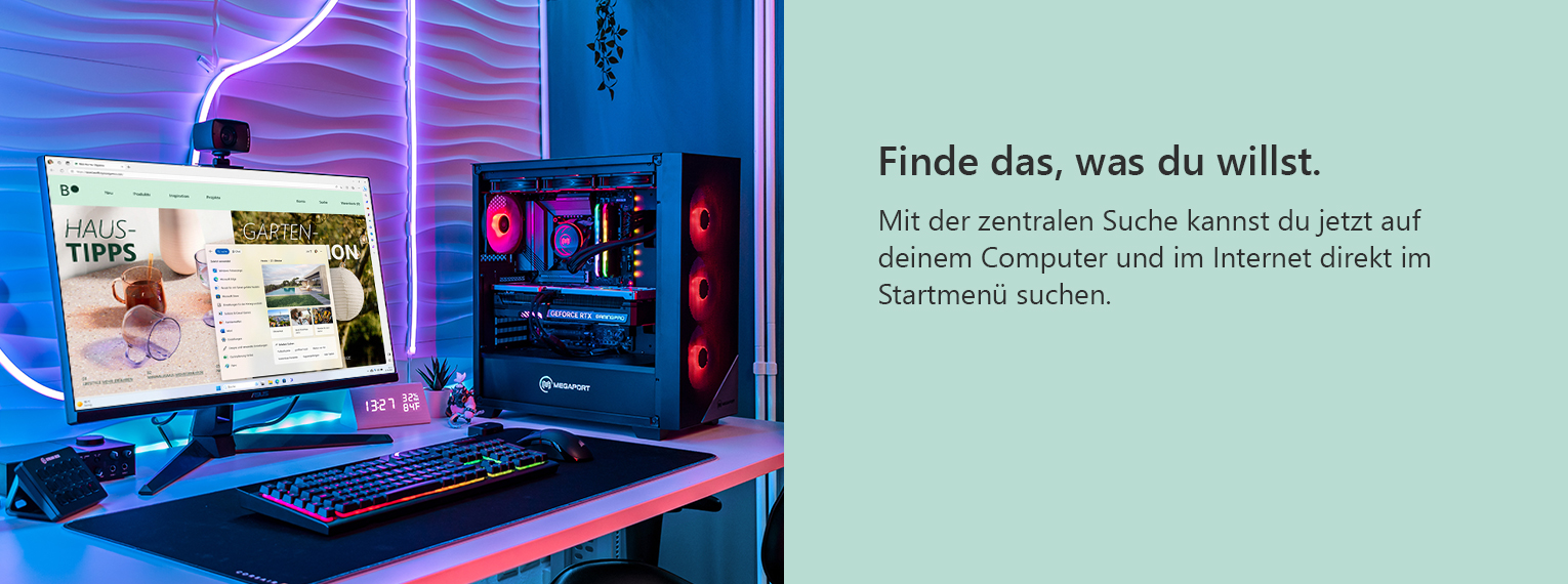 PC auf einem RGB-Setup und auf dem Bildschirm wird die Suchfunktion im Windows 11 Startmenü genutzt